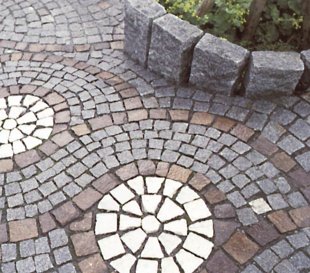 Pose en arche du pavé granit